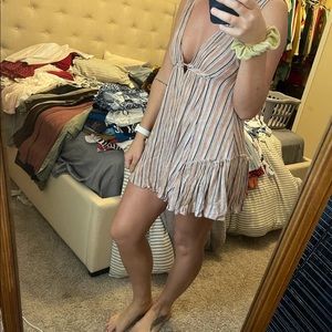 Small multi colored stripped short dress. Deel V